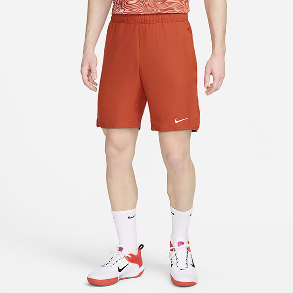 25 50 Orange Mid Thigh Length Shorts. Nike